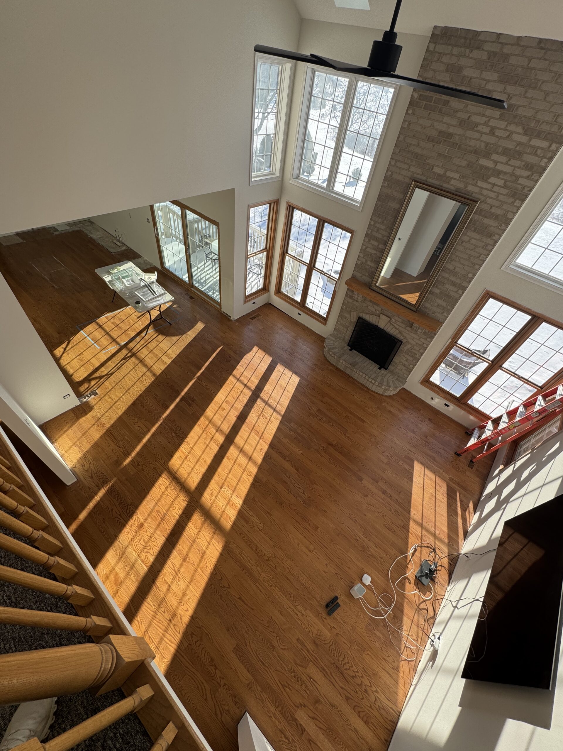hardwood floor refinishing in elegant house remodel